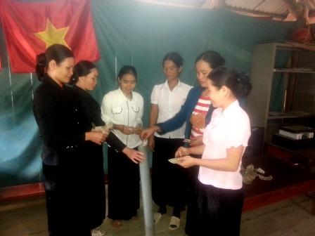   Mô hình “ống tiền tiết kiệm” của chi hội phụ nữ bản Nà Lang - xã Bum Nưa